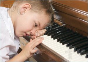 Young-Boy-Playing-Piano-1026299